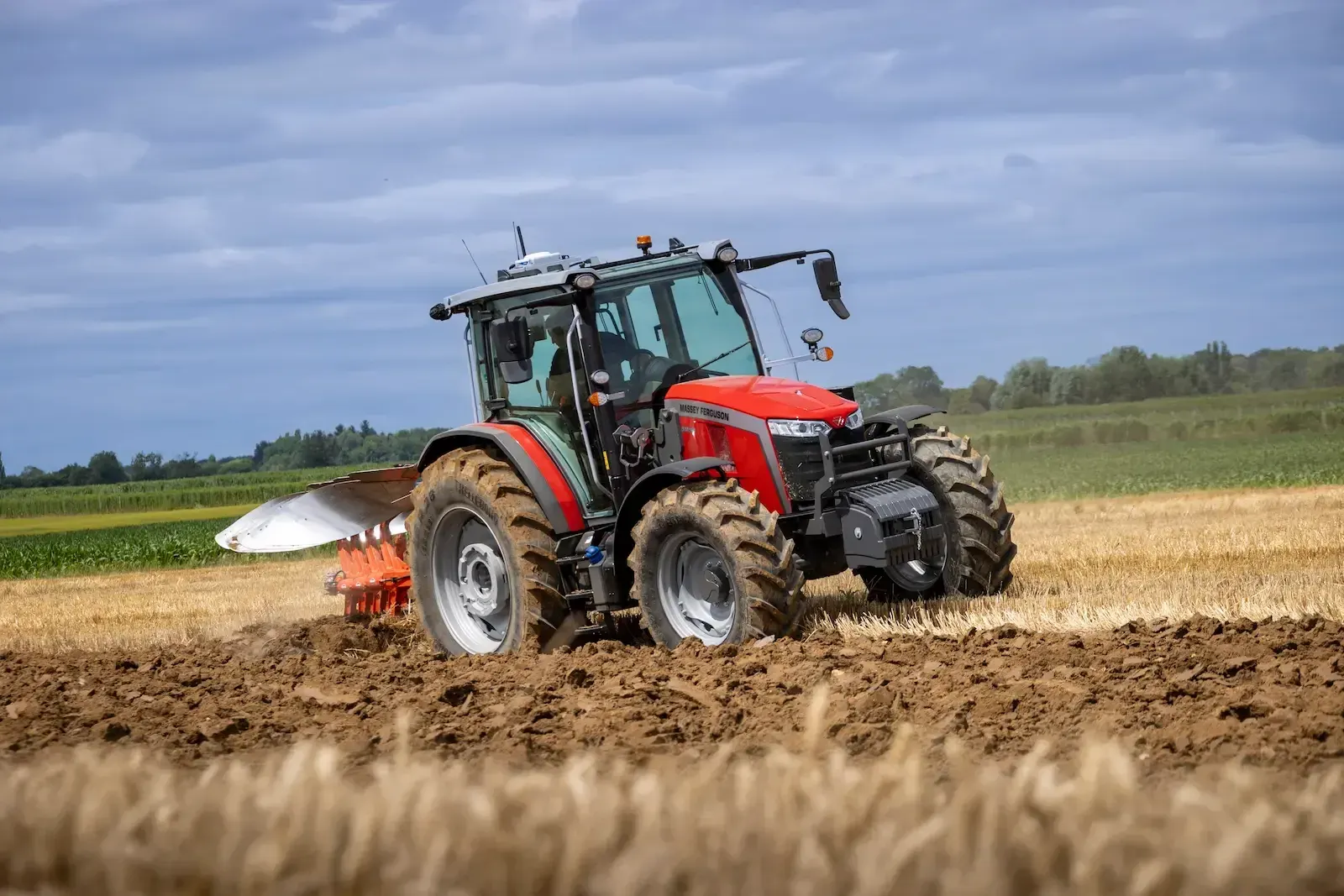 Massey Ferguson tractor ploughing a commercial field